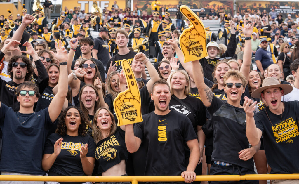 Students cheering at a UWO football game