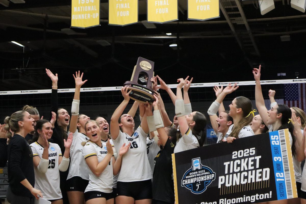 UW-Oshkosh women's volleyball team celebrating championship win